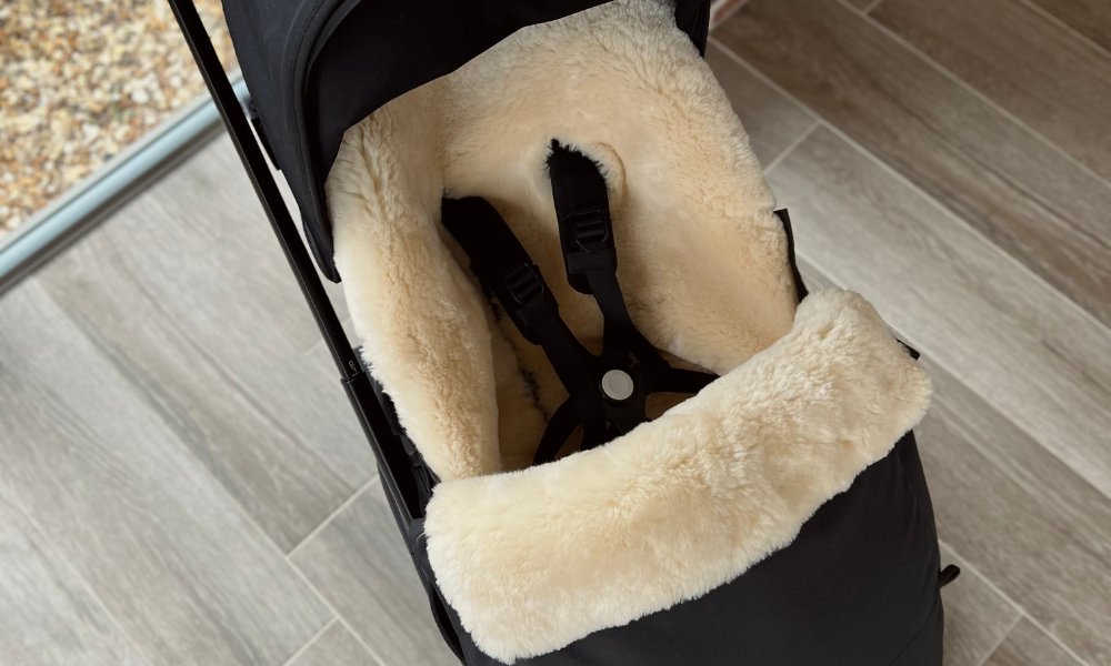 How-Do-I-Fit-A-Sheepskin-Footmuff-To-A-Pram-With-A-Solid-Back Baa Baby