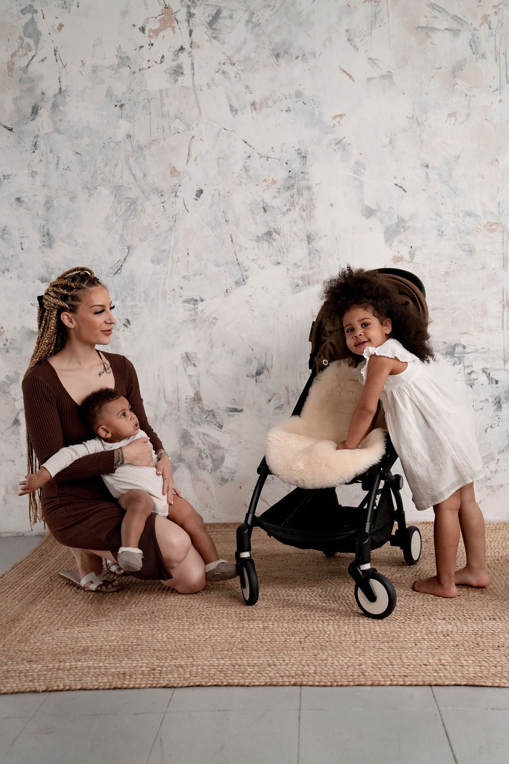 sheepskin pram liner with baby