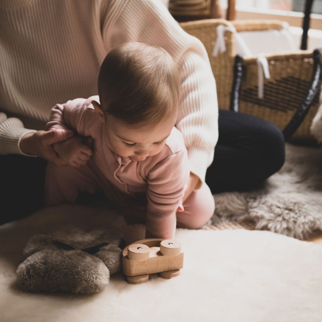 baby sheepskin liner as play mat 