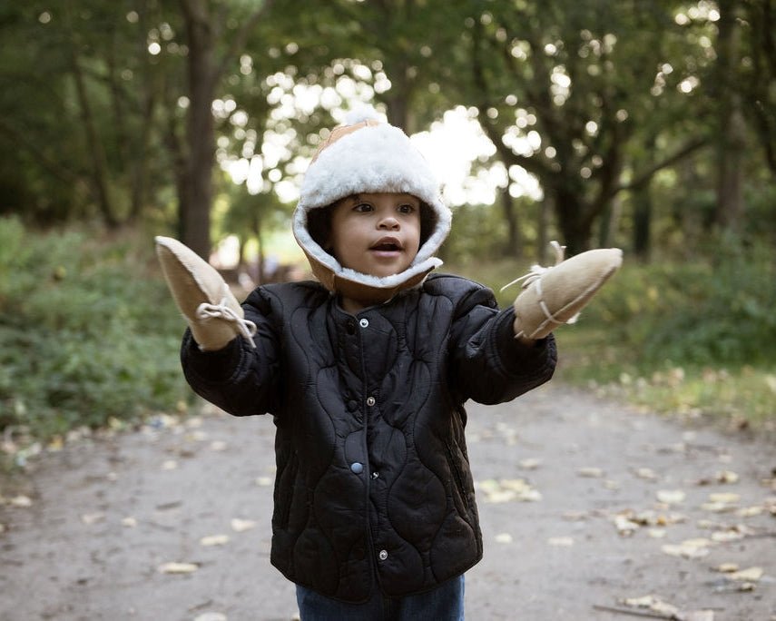 Sheepskin mittens and sheepskin hat