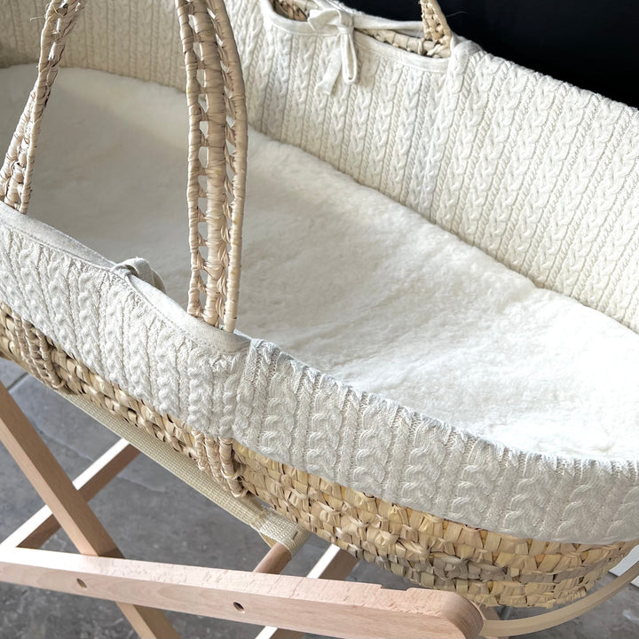 Sheepskin liner suitable for a carrycot and placed inside of a moses basket