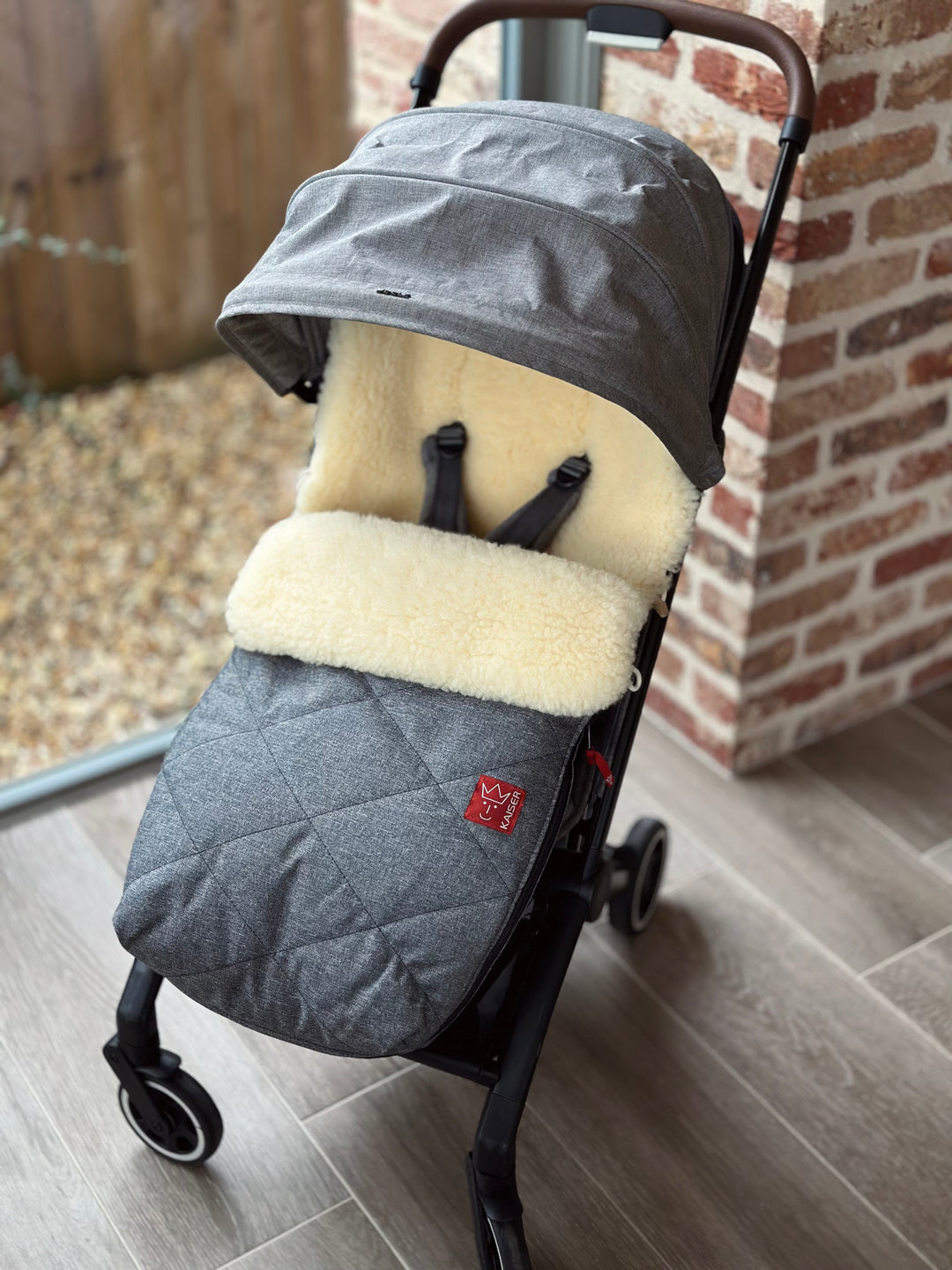 Kaiser Natura sheepskin pram footmuff shown in the Joolz Aer pram