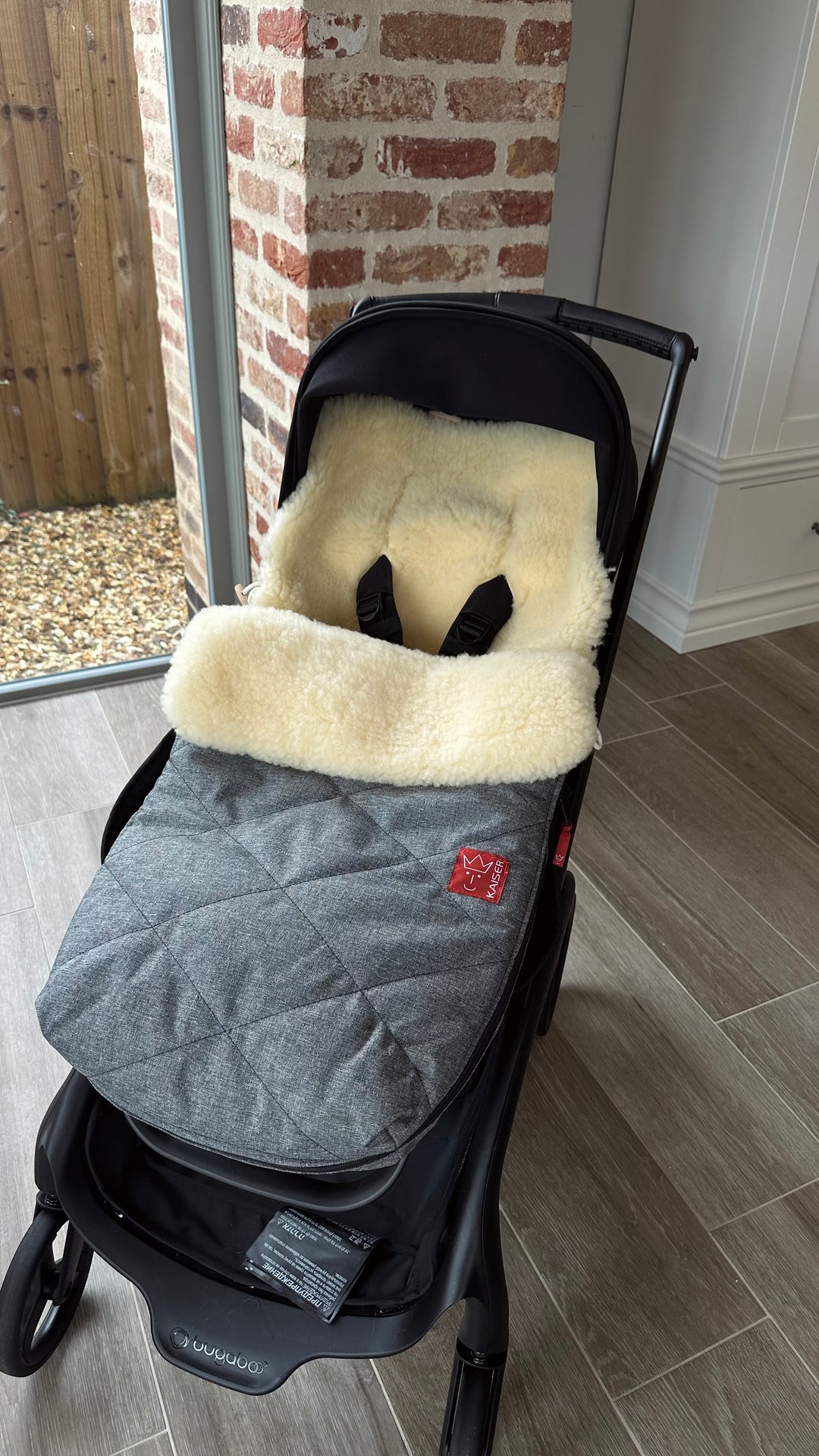 Kaiser sheepskin footmuff in the Bugaboo dragonfly pram