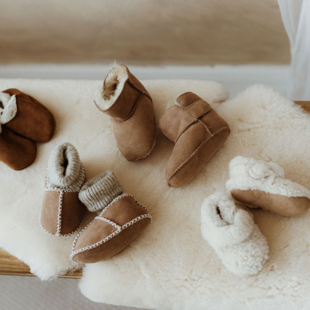 Sheepskin and merino lambskin natural baby booties, soft soled and supple for sensitive skin on newborn babies