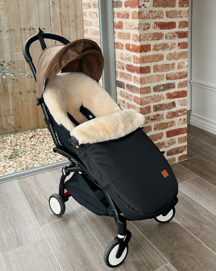 Luxury merino sheepskin pram footmuff and liner in a neutral and black Babyzen yoyo pram