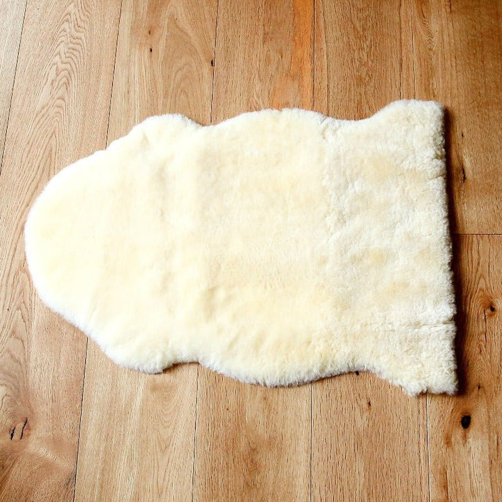 Neutral Sheepskin Rug with Shorn Pile for Tummy Time and Playtime in Baby Nursery