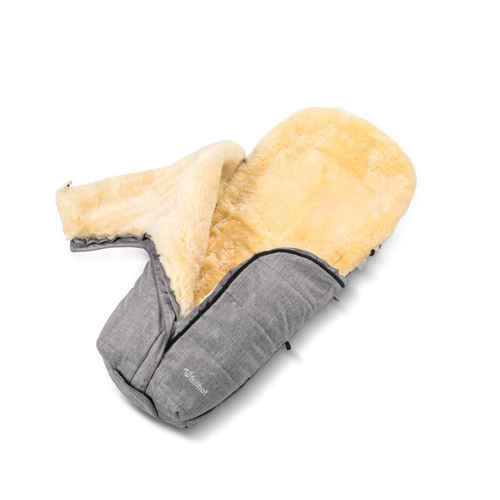 Fellhof premium sheepskin footmuff showing opening flap and top which zips off to leave a pram liner in the summer months