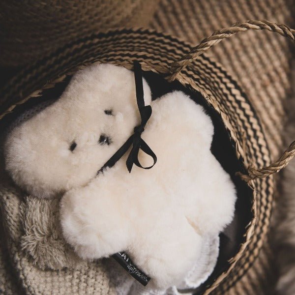 Australian Natural Sheepskin Bear with Sleeping Newborn for Comfort