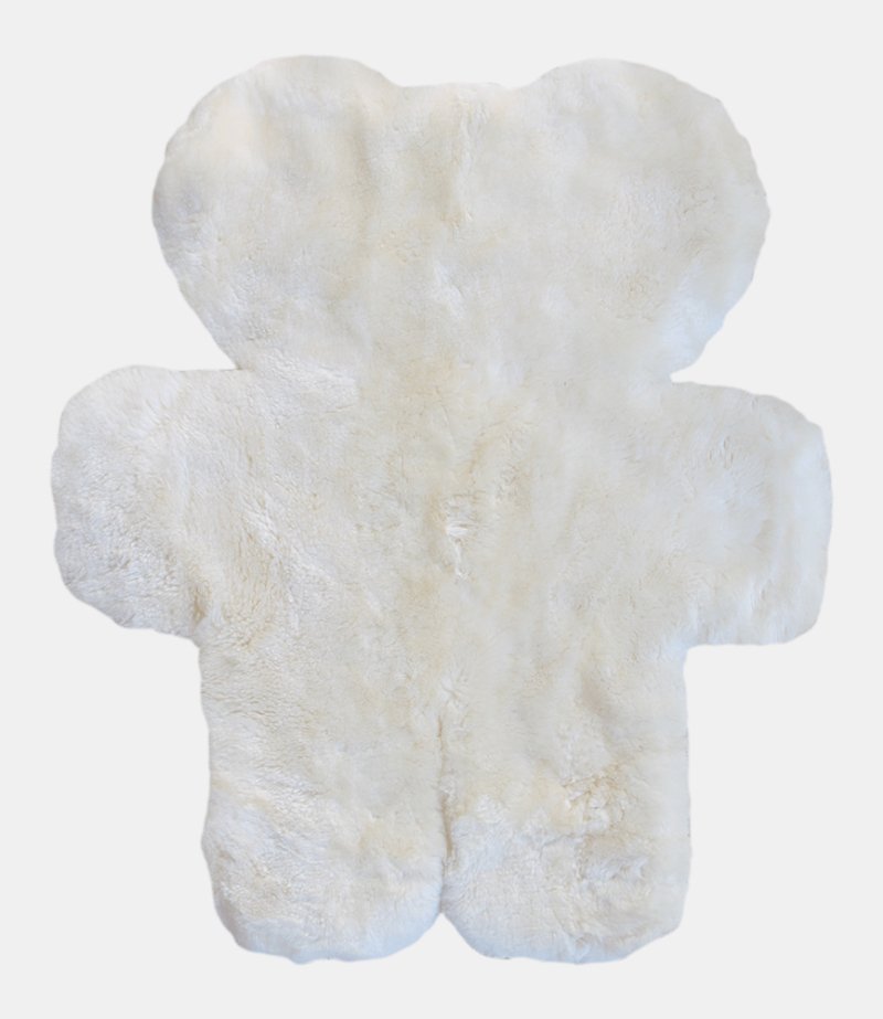 Natural Nursery Decor for Babies with Lambskin Rug Baby Safe