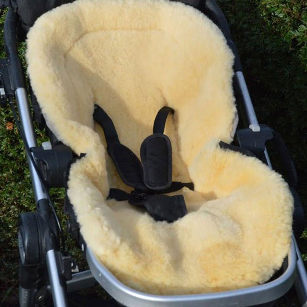 Open Kaiser Emma Footmuff Doubling as a Sheepskin Pram Liner for Warmer Months