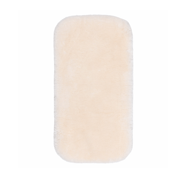 Baa Baby bassinet liner in a creamy milk colour