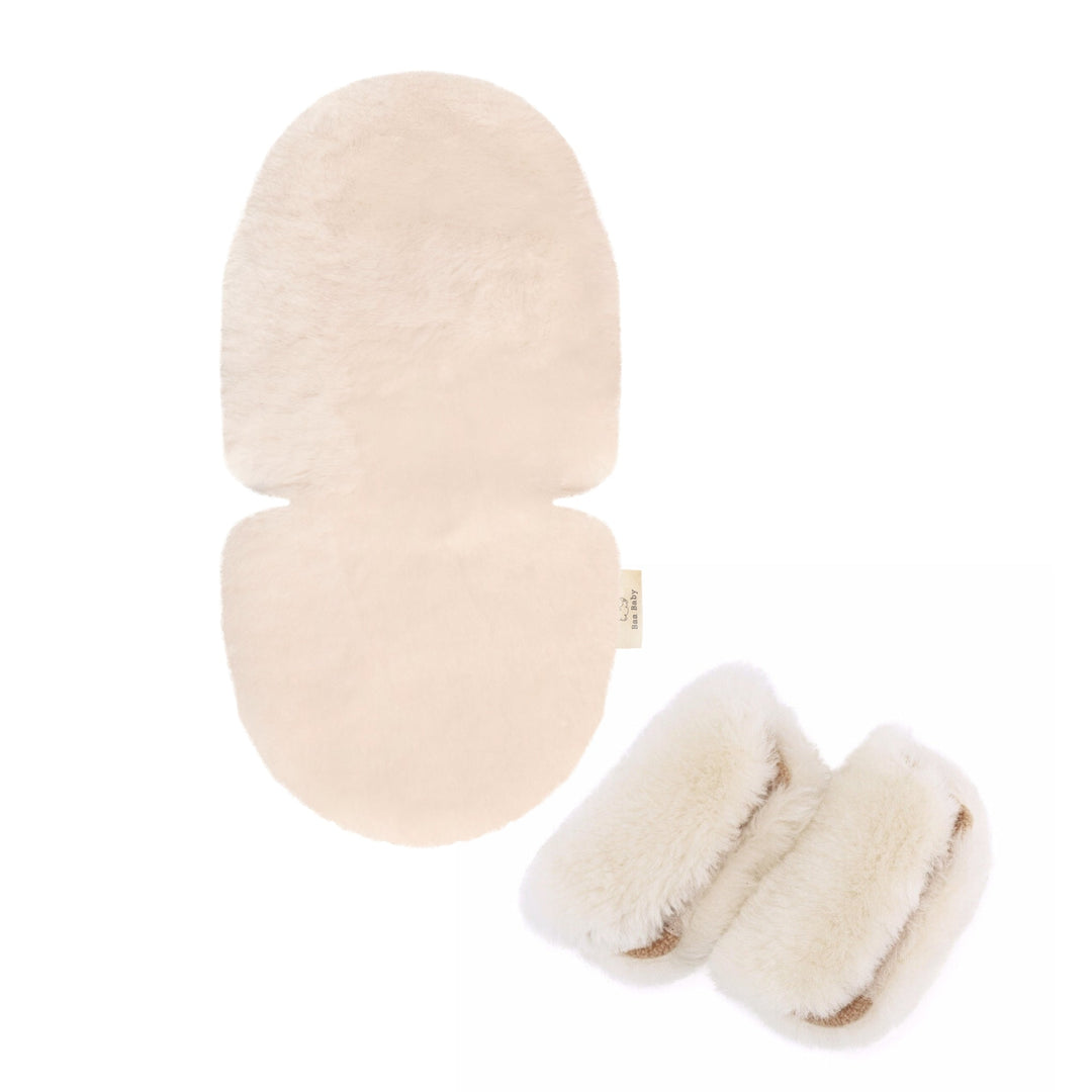 Sheepskin pram liner in milk to make the buggy comfortable for a baby with matching strap harness covers to stop the harness chafing and make them softer