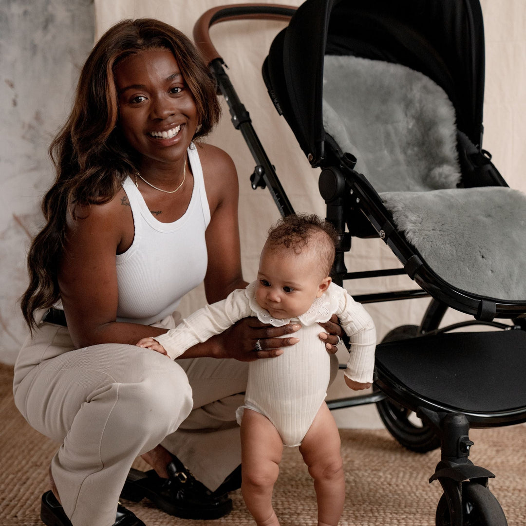 Baby in Pushchair with Baa Baby Sheepskin Bugaboo™ Buggy Liner in Shorn Grey