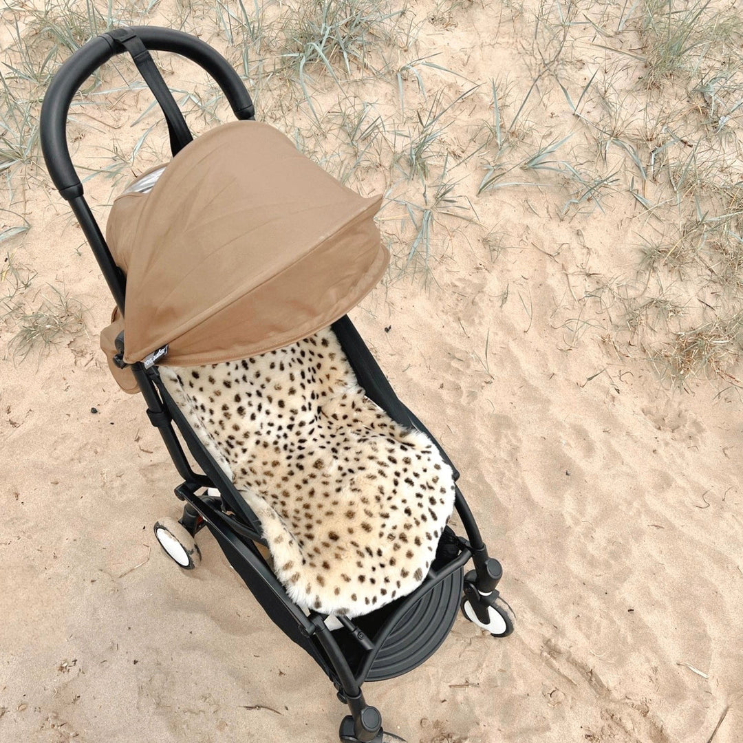 leopard sheepskin liner in a babyzen yoyo stroller