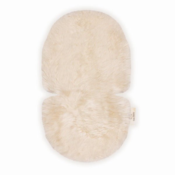 Sheepskin pram liner in a pale neutral colour